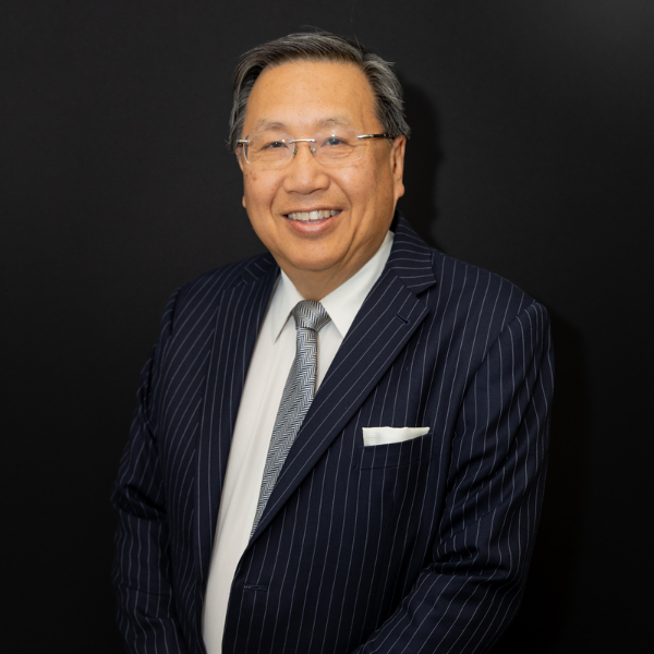Smiling man in pinstripe suit and tie